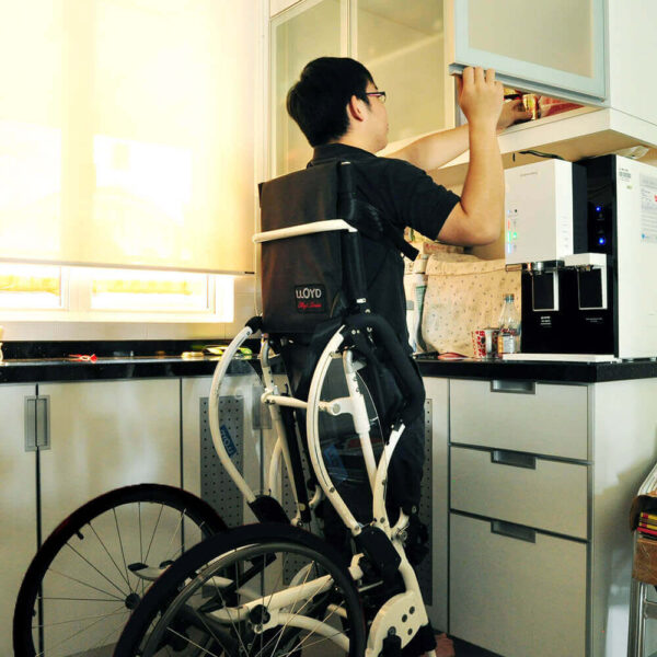 Leo Standing Wheelchair folded, showing lightweight aluminum frame and adjustable seat, designed for easy transport and daily use.