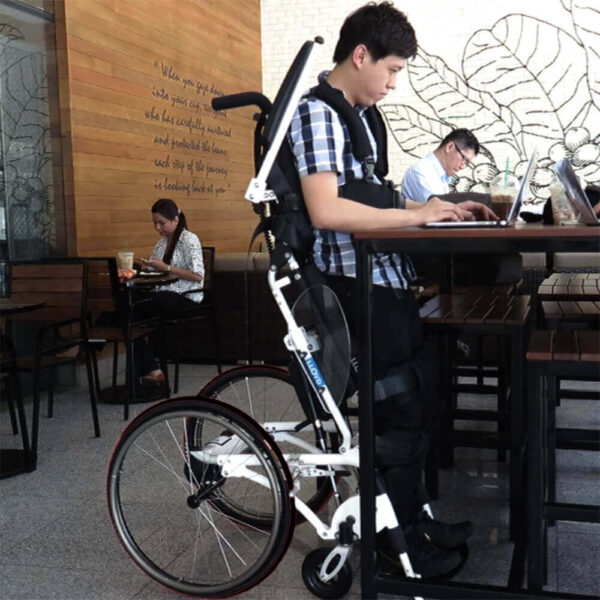 Pegasus Semi-Power Standing Wheelchair folded, showing lightweight frame and power-assisted joystick controls.