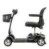Go-Go Ultra X 4-Wheel Mobility Scooter in black, featuring a compact foldable seat, solid tires, and a lightweight, travel-friendly design.