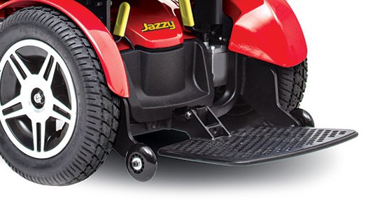 Jazzy Elite HD power wheelchair with large 14-inch flat-free tires and padded high-back seat.