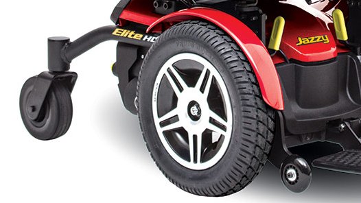 Jazzy Elite HD power wheelchair with large 14-inch flat-free tires and padded high-back seat.
