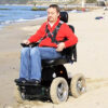 All Terrain PW-4x4Q 7 All Terrain PW-4x4Q electric wheelchair with a rugged design, 4-wheel drive system, and advanced suspension for off-road mobility.