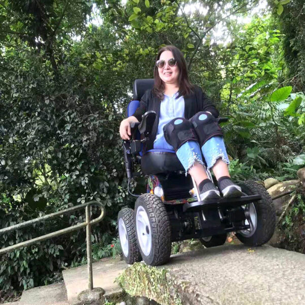 All Terrain PW-4x4Q electric wheelchair with a rugged design, 4-wheel drive system, and advanced suspension for off-road mobility.