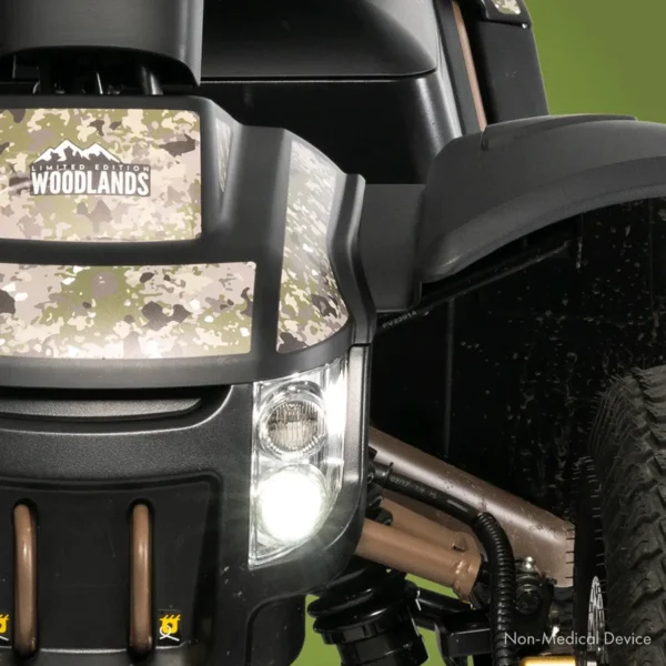 Baja Wrangler 2 all-terrain mobility scooter with large wheels, a padded captain’s seat, and high ground clearance, designed for outdoor use and rugged terrain.