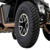 Baja Wrangler 2 Baja Wrangler 2 all-terrain mobility scooter with large wheels, a padded captain’s seat, and high ground clearance, designed for outdoor use and rugged terrain.