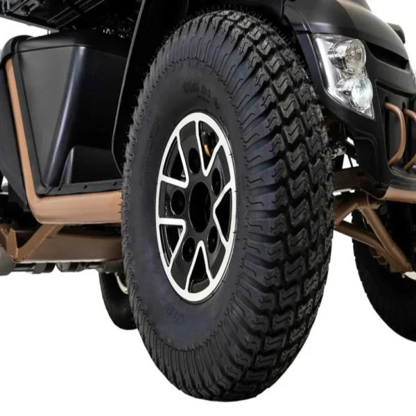 Baja Wrangler 2 all-terrain mobility scooter with large wheels, a padded captain’s seat, and high ground clearance, designed for outdoor use and rugged terrain.