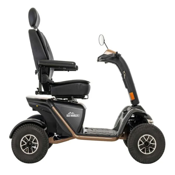 Baja Wrangler 2 all-terrain mobility scooter with large wheels, a padded captain’s seat, and high ground clearance, designed for outdoor use and rugged terrain.