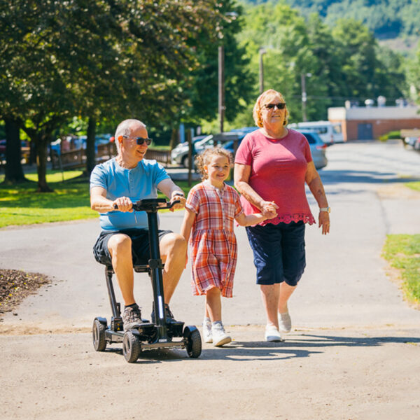 GoGo Carbon lightweight folding scooter featuring a sleek carbon fiber frame, designed for easy portability and compact storage, ideal for daily mobility needs.