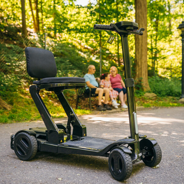 GoGo Carbon lightweight folding scooter featuring a sleek carbon fiber frame, designed for easy portability and compact storage, ideal for daily mobility needs.
