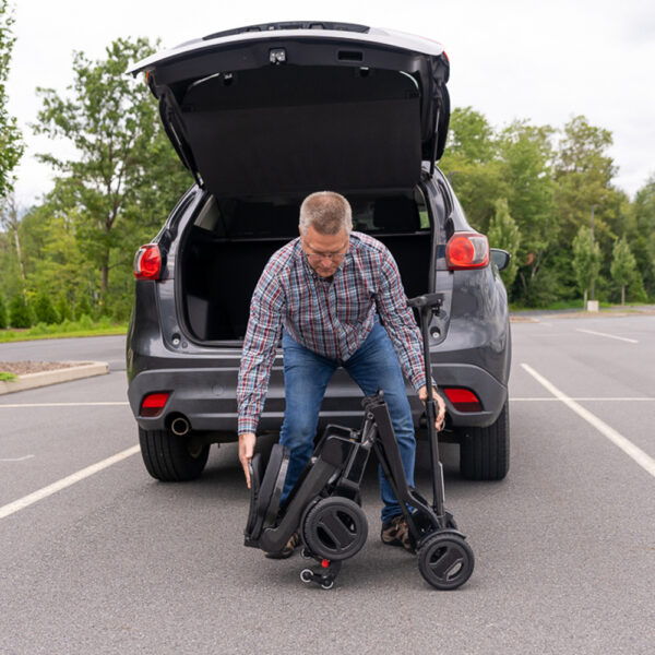GoGo Carbon lightweight folding scooter featuring a sleek carbon fiber frame, designed for easy portability and compact storage, ideal for daily mobility needs.
