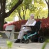 Ally Folding Power Wheelchair with sleek design, remote app control, and easy folding mechanism, perfect for both indoor use and smooth outdoor surfaces.