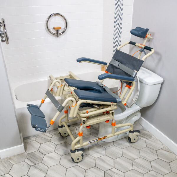 TubBuddy Tilt shower and commode chair with padded seat, adjustable footrests, corrosion-resistant aluminum frame, and tilt-in-space functionality for enhanced comfort.
