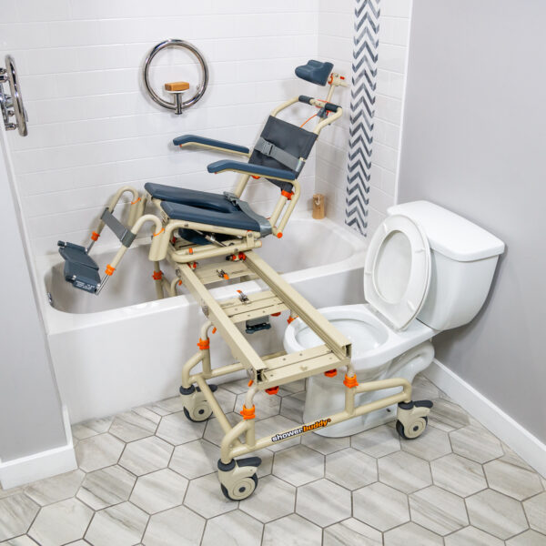 TubBuddy Tilt shower and commode chair with padded seat, adjustable footrests, corrosion-resistant aluminum frame, and tilt-in-space functionality for enhanced comfort.