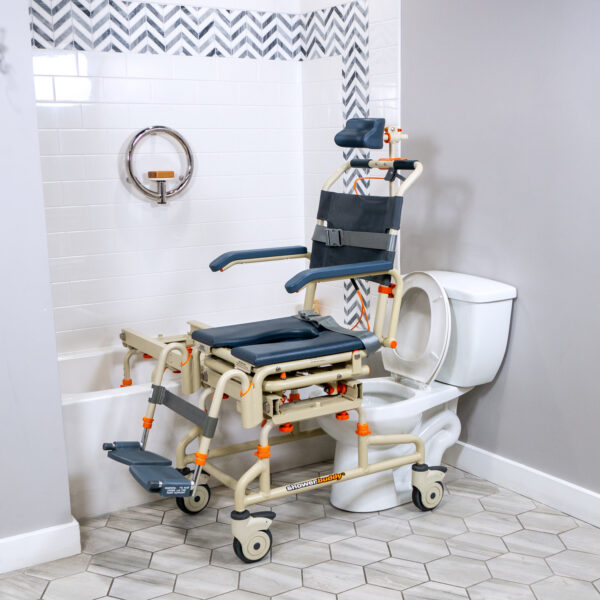 TubBuddy Tilt shower and commode chair with padded seat, adjustable footrests, corrosion-resistant aluminum frame, and tilt-in-space functionality for enhanced comfort.