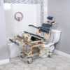 TubBuddy Tilt shower and commode chair with padded seat, adjustable footrests, corrosion-resistant aluminum frame, and tilt-in-space functionality for enhanced comfort.