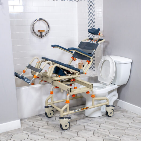 TubBuddy Tilt shower and commode chair with padded seat, adjustable footrests, corrosion-resistant aluminum frame, and tilt-in-space functionality for enhanced comfort.