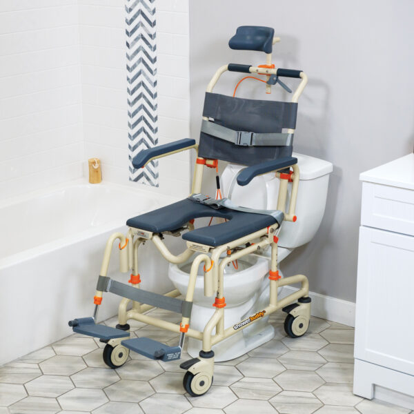 Roll-inBuddy Tilt shower and commode chair with padded seat, headrest, adjustable footrests, and corrosion-resistant frame, designed for enhanced safety and comfort.