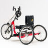 Top End Lil’ Excelerator Handcycle in vibrant red, designed for kids and small adults. The sleek, low-profile frame is equipped with ergonomic hand pedals and three large wheels for stability and smooth maneuverability.
