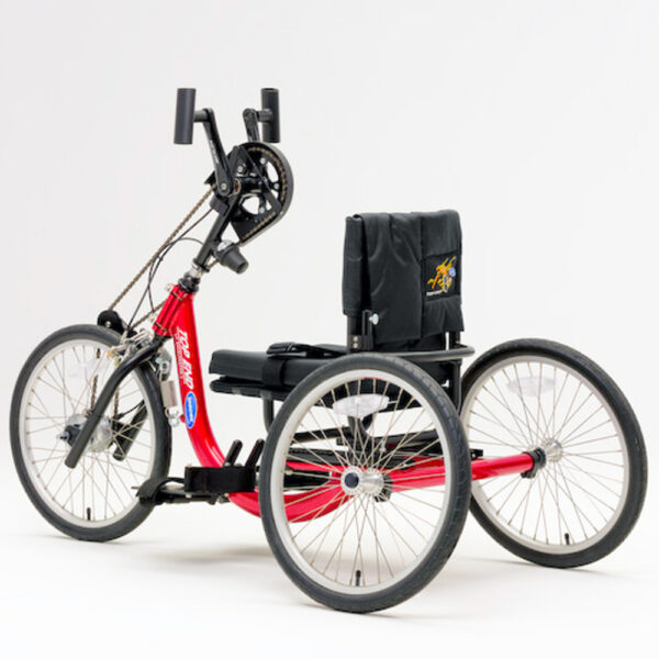 Top End Lil’ Excelerator Handcycle in vibrant red, designed for kids and small adults. The sleek, low-profile frame is equipped with ergonomic hand pedals and three large wheels for stability and smooth maneuverability.
