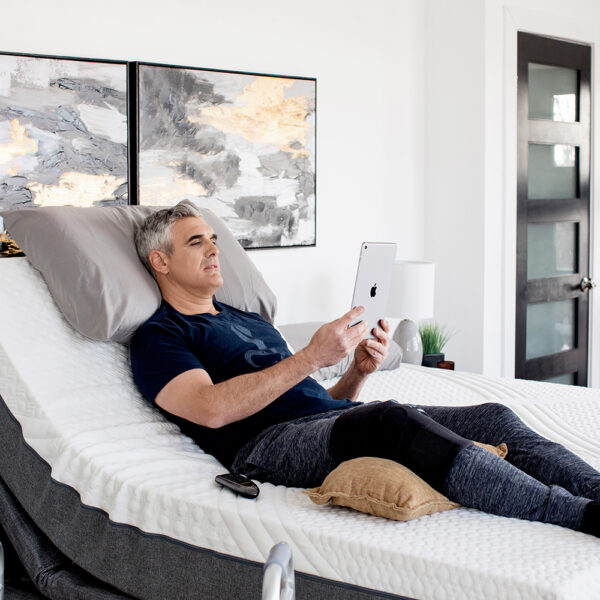 Golden Passport Hi-Low Adjustable Bed with customizable height and mattress options, shown with head and foot sections raised.