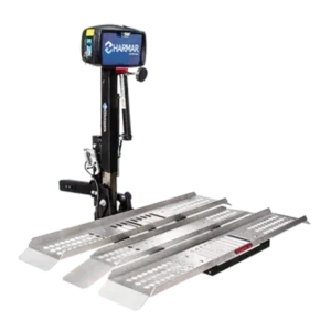 Harmar AL100-DE Exterior Hitch-Mount Platform Lift attached to a vehicle, transporting a mobility scooter with a dual-entry platform.
