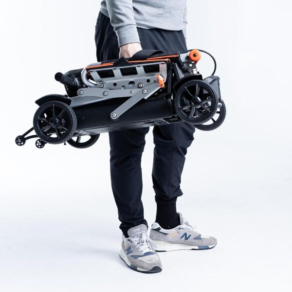 Feather 27X Scooter, ultra-lightweight at 27 lbs, folded compactly for travel, black with red accents, four-wheel design.