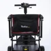 Feather Scooter in black with red trim, lightweight at 37 lbs, foldable design for easy transport and compact storage.