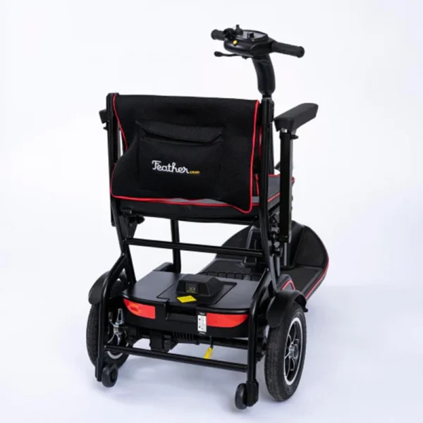 Feather Scooter in black with red trim, lightweight at 37 lbs, foldable design for easy transport and compact storage.