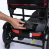 Feather Scooter in black with red trim, lightweight at 37 lbs, foldable design for easy transport and compact storage.