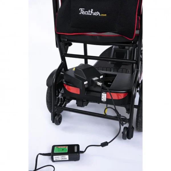 Feather Scooter in black with red trim, lightweight at 37 lbs, foldable design for easy transport and compact storage.