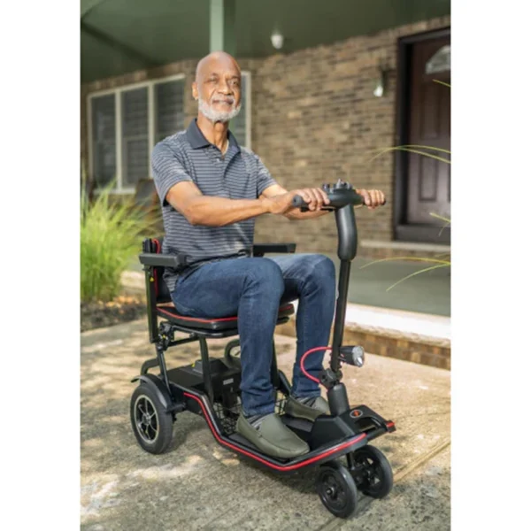 Feather Scooter in black with red trim, lightweight at 37 lbs, foldable design for easy transport and compact storage.