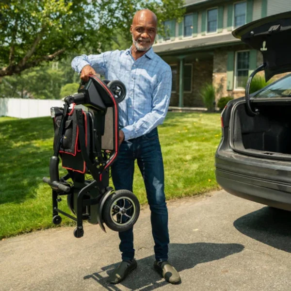 Feather Scooter in black with red trim, lightweight at 37 lbs, foldable design for easy transport and compact storage.