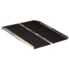 Harmar Single Fold Ramp folded in half with a carrying handle, placed on a curb, showing its lightweight and portable design.
