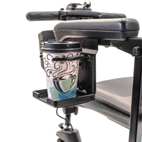 Cup holder attached under the armrest padding of a Pride Mobility scooter, securely holding a beverage for easy access during travel.