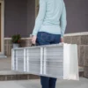 SUITCASE Singlefold Ramp EZ-ACCESS SUITCASE® Singlefold Ramp fully extended, featuring a slip-resistant surface, ergonomic carrying handles, and lightweight aluminum construction, designed for wheelchairs and scooters."