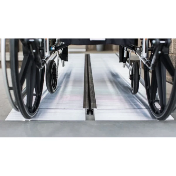EZ-ACCESS SUITCASE® Singlefold Ramp fully extended, featuring a slip-resistant surface, ergonomic carrying handles, and lightweight aluminum construction, designed for wheelchairs and scooters."