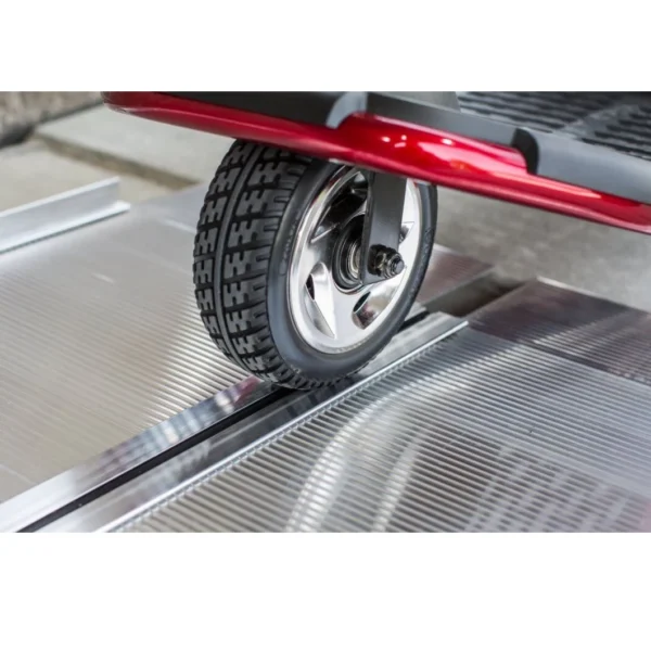 EZ-ACCESS SUITCASE® Singlefold Ramp fully extended, featuring a slip-resistant surface, ergonomic carrying handles, and lightweight aluminum construction, designed for wheelchairs and scooters."