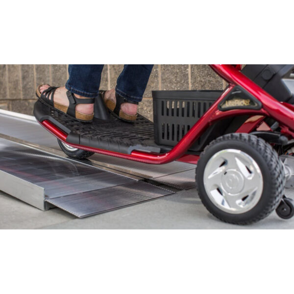 EZ-ACCESS SUITCASE® Singlefold Ramp fully extended, featuring a slip-resistant surface, ergonomic carrying handles, and lightweight aluminum construction, designed for wheelchairs and scooters."