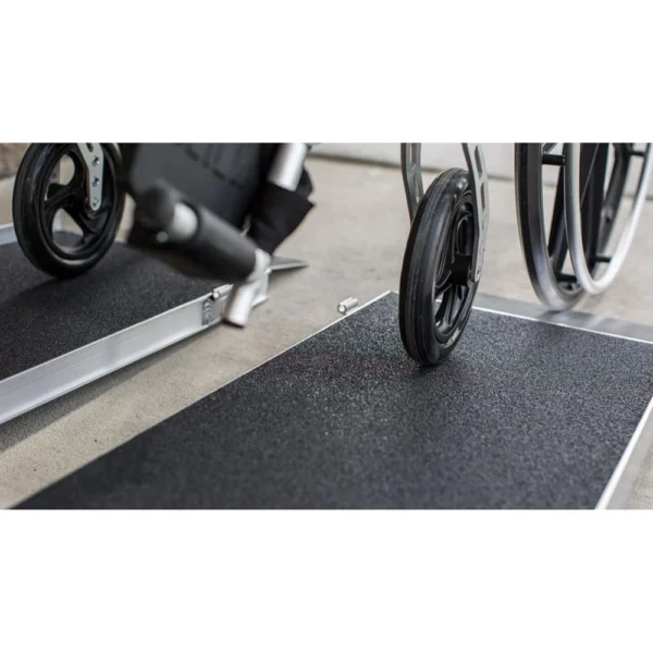 EZ-Access SUITCASE® Advantage Series Ramp folded in half, designed for quick setups and easy transport, providing secure wheelchair and scooter access.