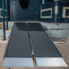 EZ-Access SUITCASE® Advantage Series Ramp folded in half, designed for quick setups and easy transport, providing secure wheelchair and scooter access.