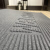 EZ-Access TRANSITIONS® Angled Entry Mat with slip-resistant surface, designed for safe access over raised thresholds for wheelchairs and mobility devices.