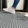 EZ-Access TRANSITIONS® Angled Entry Mat with slip-resistant surface, designed for safe access over raised thresholds for wheelchairs and mobility devices.