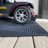 EZ-Access TRANSITIONS® Angled Entry Mat with slip-resistant surface, designed for safe access over raised thresholds for wheelchairs and mobility devices.