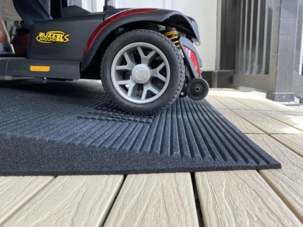 EZ-Access TRANSITIONS® Angled Entry Mat with slip-resistant surface, designed for safe access over raised thresholds for wheelchairs and mobility devices.