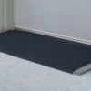 Lightweight EZ-Access TRANSITIONS® Angled Entry Plate, providing safe access for mobility devices over raised thresholds with slip-resistant surface.