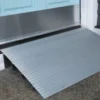 transitions-modular-entry-ramp_addl-2_e6318f05-d0c9-4975-9973-9440e829d569 EZ-Access TRANSITIONS® Modular Entry Ramp with slip-resistant surface, providing safe access over doorways and raised landings.