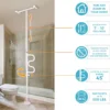 Security Pole & Curve Grab Bar in a home setting, featuring an ergonomic curved grab bar and a tension-mounted, space-saving design.