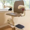 SL600-2-600×400-1 Harmar Pinnacle SL600 Stair Lift installed on a staircase, showcasing its compact folded profile and smooth operation.