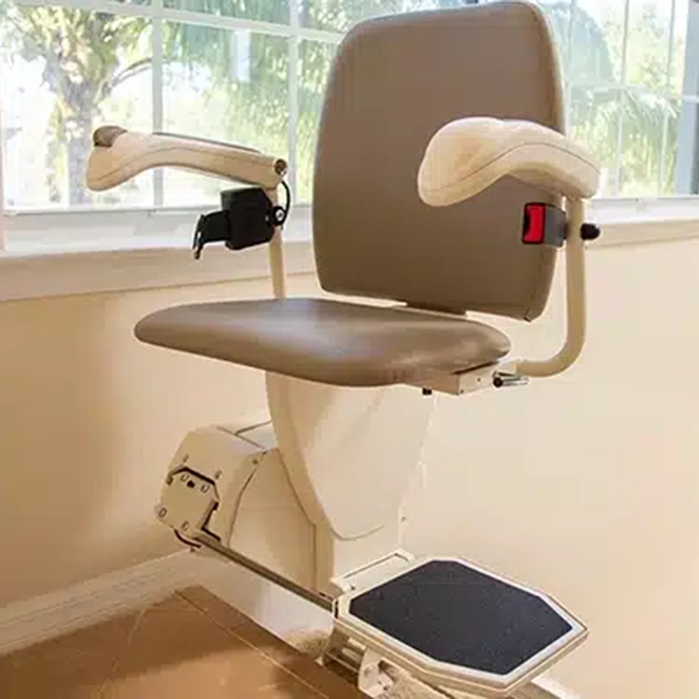 Harmar Pinnacle SL600 Stair Lift installed on a staircase, showcasing its compact folded profile and smooth operation.