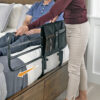 Stander EZ Adjust Bed Rail extended on a bed, showing adjustable length and pivot feature for safe, convenient transfers.